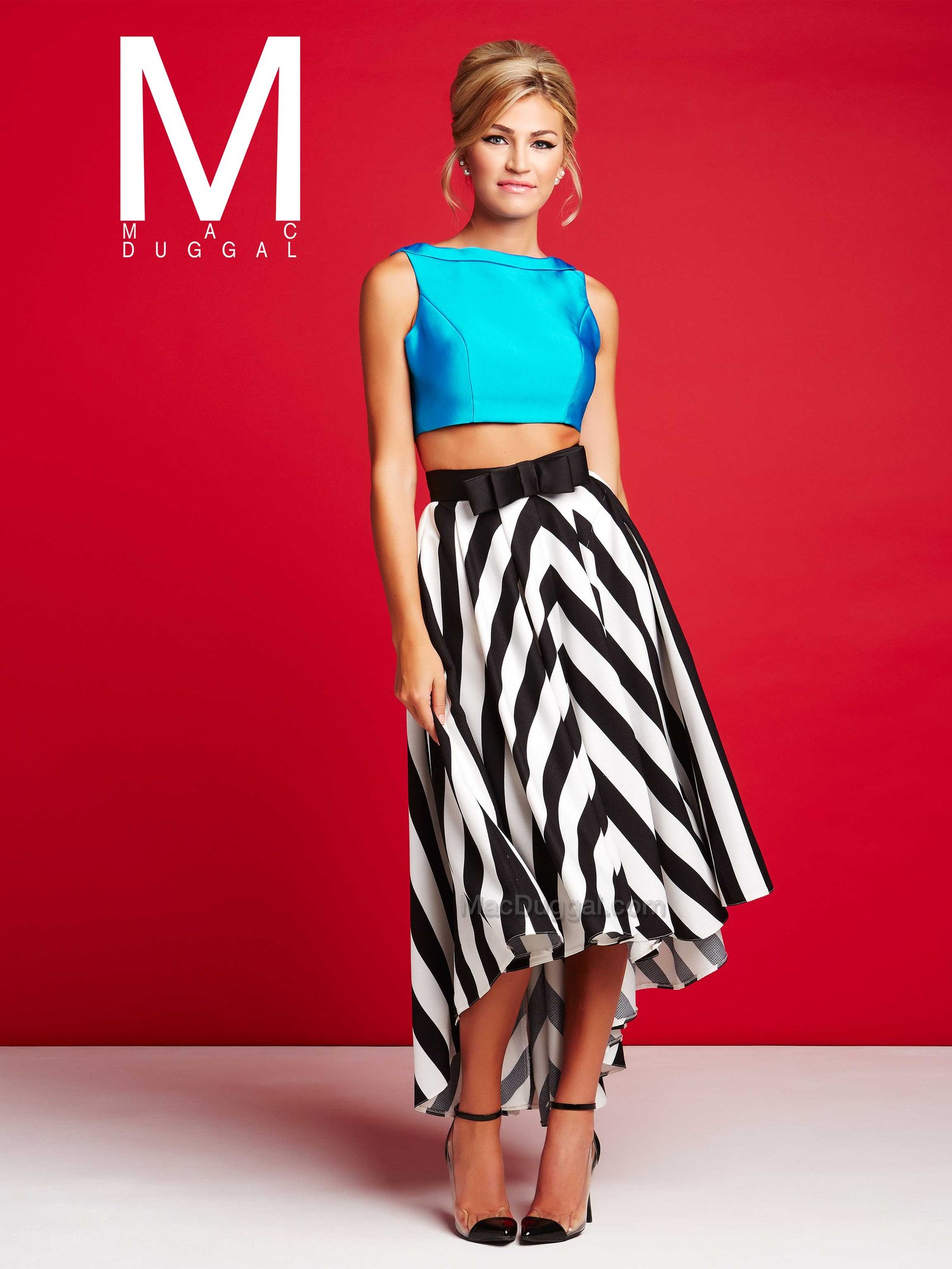 Two-piece crop top and high low striped skirt